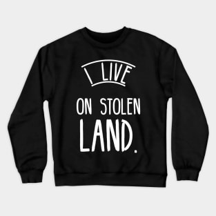 I live on stolen land Crewneck Sweatshirt